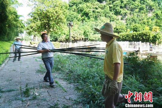 图为象山景区启动“拆围透景”行动。 唐梦宪 摄 图为象山景区启动“拆围透景”行动。 唐梦宪 摄