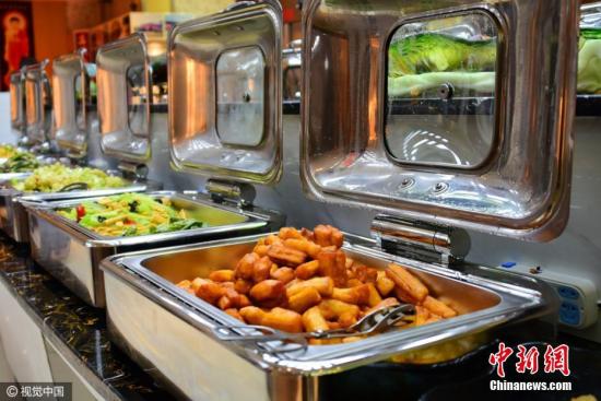 资料图:郑州免费素食自助餐厅开放 要求食客必须“光盘” 资料图:郑州免费素食自助餐厅开放 要求食客必须“光盘”