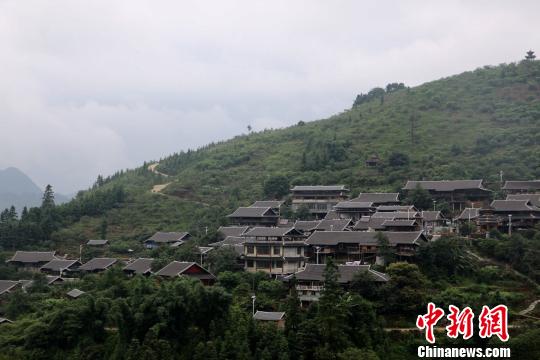 广西融水苗族自治县四荣乡归报屯,发展旅游让该村面貌一新。 林馨 摄 广西融水苗族自治县四荣乡归报屯,发展旅游让该村面貌一新。 林馨 摄
